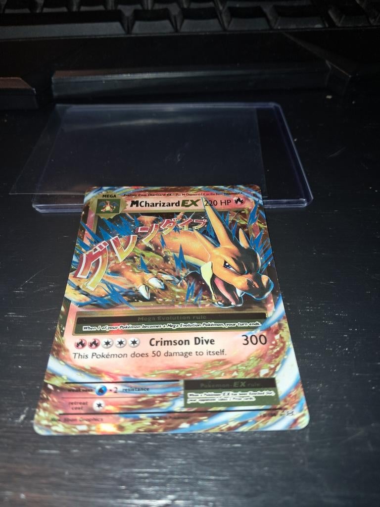Pokémon M Charizard EX Kaart, Ophalen of Verzenden, Zo goed als nieuw, Losse kaart, Foil