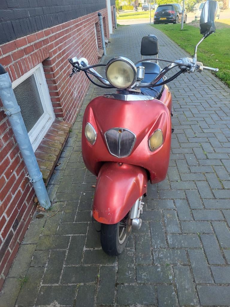 Scooter met blauw kenteken, Ophalen of Verzenden