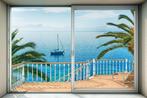 Vlies fotobehang Tranquillo | Strand behang 3D effect, Huis en Inrichting, Stoffering | Behang, Verzenden, 10 tot 25 m², Vakantie, strand, zee, palm, 3D