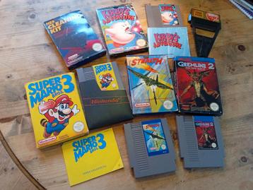 Nintendo Nes Spellen in doosje met cleaning kit en GameGenie beschikbaar voor biedingen