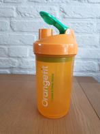 Orangefit shaker. Proteïne shaker. 600 ml. Incl. container., Sport en Fitness, Ophalen of Verzenden, Zo goed als nieuw