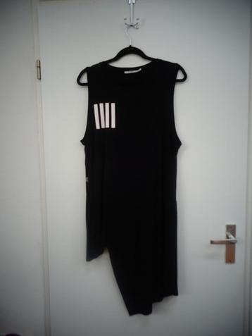 Mat fashion tuniek, asymmeteisch, zwart met wit, mouwloos 44 beschikbaar voor biedingen