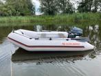 Rubberboot met buitenboordmotor Yamaha 4PK, Watersport en Boten, Rubberboten, Ophalen, Yamaha, Zo goed als nieuw, Hout