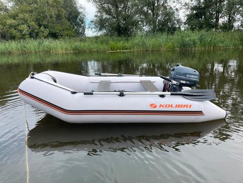 Rubberboot met buitenboordmotor Yamaha 4PK, Watersport en Boten, Rubberboten, Zo goed als nieuw, Yamaha, Hout, Minder dan 70 pk
