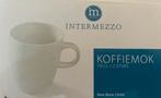 2 koffiemokken Intermezzo in origenele verpakking, Ophalen of Verzenden, Zo goed als nieuw, Glas, Overige stijlen