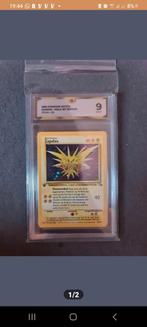 Zapdos holo first edition #15 grade 9
Global grading, Ophalen of Verzenden, Zo goed als nieuw