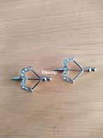 Nieuwe tepelpiercing. Pijl en boog. Steentjes. Wit., Ophalen of Verzenden, Zo goed als nieuw, Staal