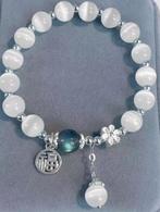 Armband wit/blauw elastisch (nieuw in verpakking), Ophalen of Verzenden, Nieuw, Blauw, Zilver