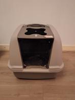 Grote kattenbak, Ophalen