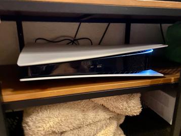 PlayStation 5 met controller en spellen beschikbaar voor biedingen