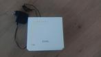 Dsl Router Zylex T-50 GRATIS, Ophalen, Zo goed als nieuw, Router met modem, ZyXEL