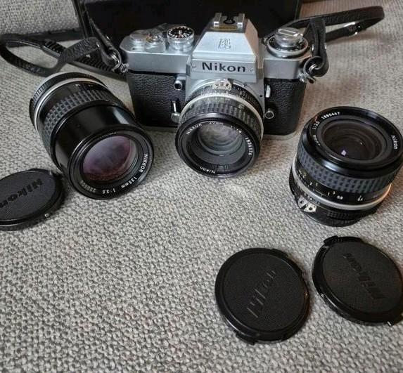 Nikon EL2 camera met 50, 28 en 135mm lens + vintage case, Audio, Tv en Foto, Fotocamera's Analoog, Zo goed als nieuw, Spiegelreflex
