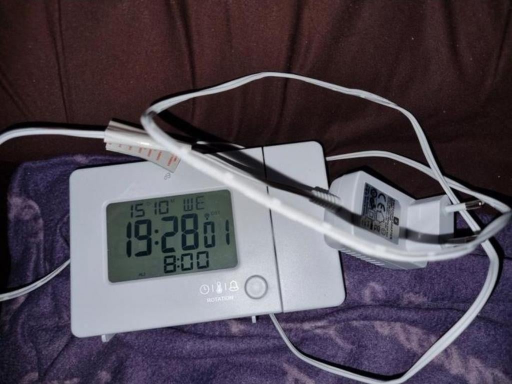 Klok zie foto's bieden, Ophalen of Verzenden, Zo goed als nieuw, Digitaal