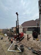Stalen buispalen heipalen fundering beton heimachine  Heien