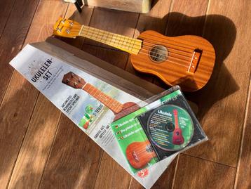 Nieuw in doos: ukelele + cursus beschikbaar voor biedingen