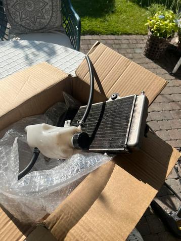 Orginele runner radiateur en h2p kvs tankje zip beschikbaar voor biedingen