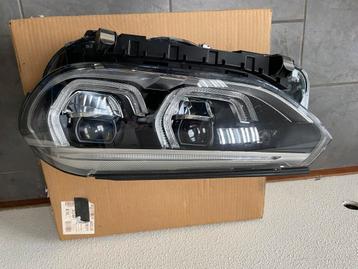 Te koop gebruikte linker koplamp met bevestiging  BMW X3 beschikbaar voor biedingen