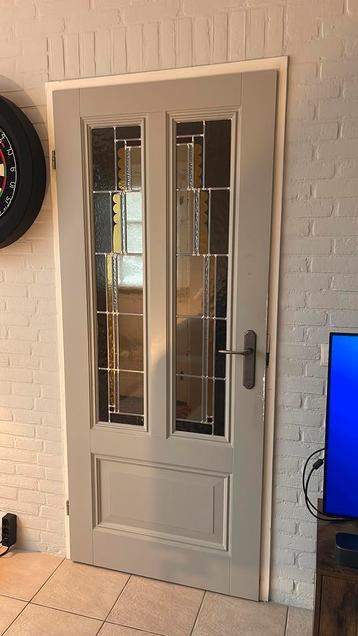 Opdekdeur met glas-in-lood beschikbaar voor biedingen