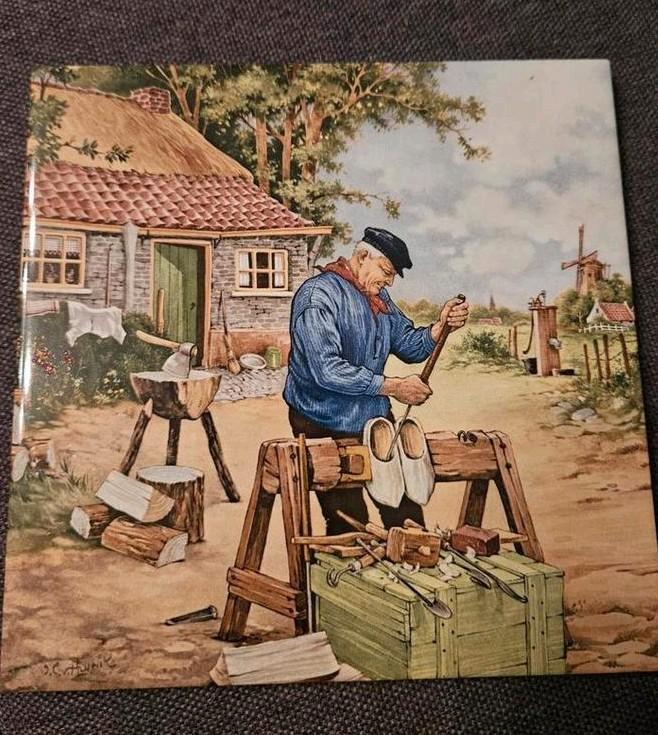 Klompenmaker tegeltje JC van Hunnik. 1984 Ter Steege., Antiek en Kunst, Antiek | Wandborden en Tegels, Ophalen of Verzenden