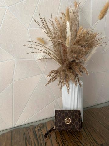 Nieuwe portemonnee beschikbaar voor biedingen