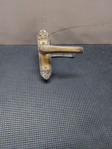 Antieke Koperen Deurklink beschikbaar voor biedingen