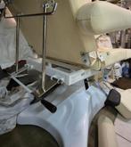 Hydraulische behandelstoel, Ophalen