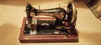 Antieke Singer Naaimachine, Ophalen
