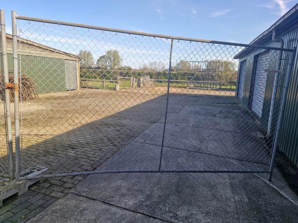 2 hekken B&G 3,50x1,80 meter met 4 Heras standblokken, Ophalen, Gebruikt, IJzer