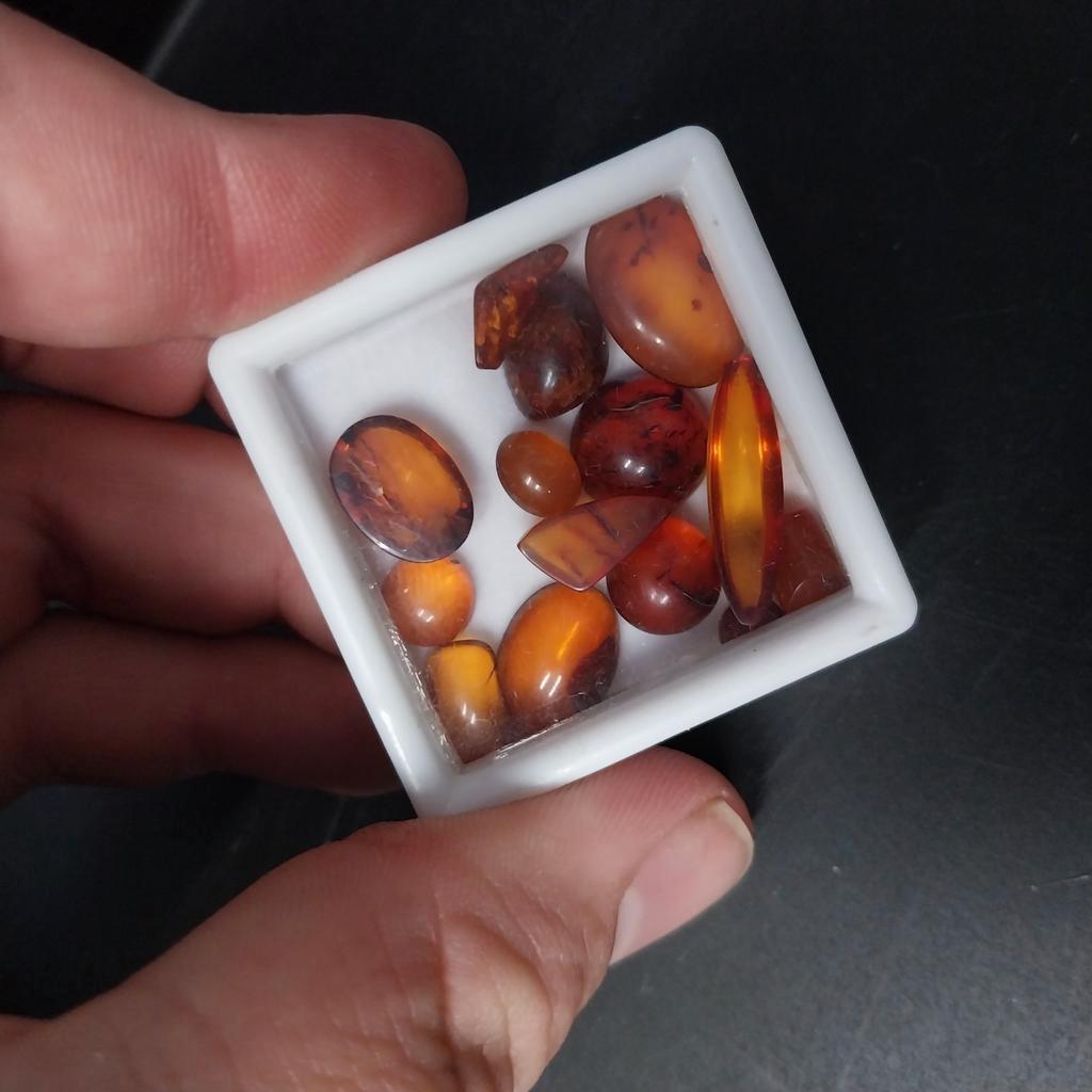 Lot met verschillende barnsteen cabochons, Sieraden, Tassen en Uiterlijk, Edelstenen, Ophalen of Verzenden