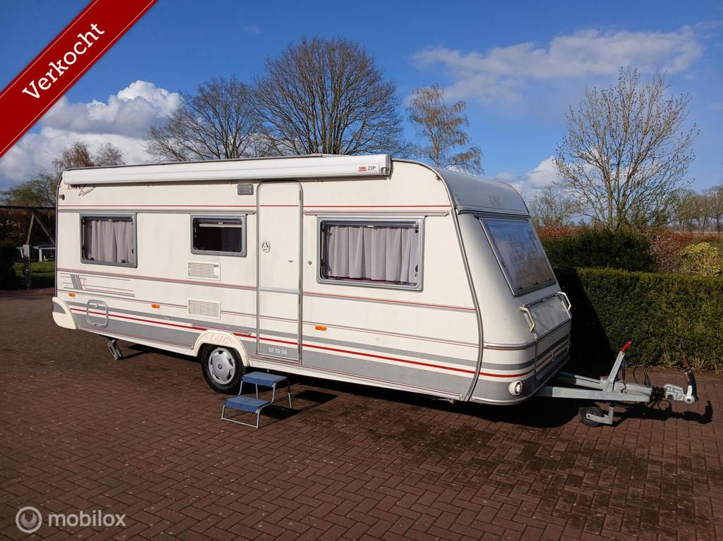 LMC Dominant 535E, Enkele Bedden, Fiamma Zip Cassette Luifel, Caravans en Kamperen, LMC, Rondzit, 7 tot 8 meter, Bedrijf