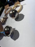 Verzilverde rammelaars, Ophalen, Zilver