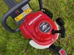 Nieuwe HONDA heggenschaar (type HHH 25D-60, 25 cc. (4 takt)), Tuin en Terras, Heggenscharen, Honda, Honda, Nieuw, Ophalen of Verzenden