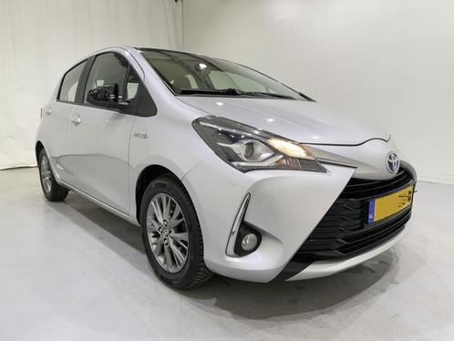 Toyota Yaris 1.5 Hybrid Aspiration Clima (bj 2017), Auto diversen, Schadeauto's, Automaat, Benzine, Overige carrosserieën, Zilver of Grijs