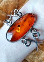 Zilveren armband met grote barnsteen, Verzenden