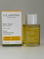 Clarins Tonic Treatment Oil 30 ml, Sieraden, Tassen en Uiterlijk, Uiterlijk | Lichaamsverzorging, Nieuw, Ophalen of Verzenden