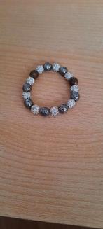 Mooie armband met kralen, Gebruikt, Ophalen of Verzenden, Elastiek, Grijs