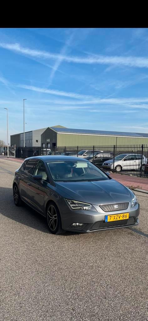 Seat Leon 1.6 TDI 81KW/110PK 2014 Grijs, Auto's, Seat, Particulier, Leon, ABS, Airbags, Airconditioning, Apple Carplay, Bluetooth