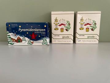 Oude feestkaarsjes wit en rood beschikbaar voor biedingen