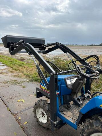 Voorlader mini trekker. beschikbaar voor biedingen