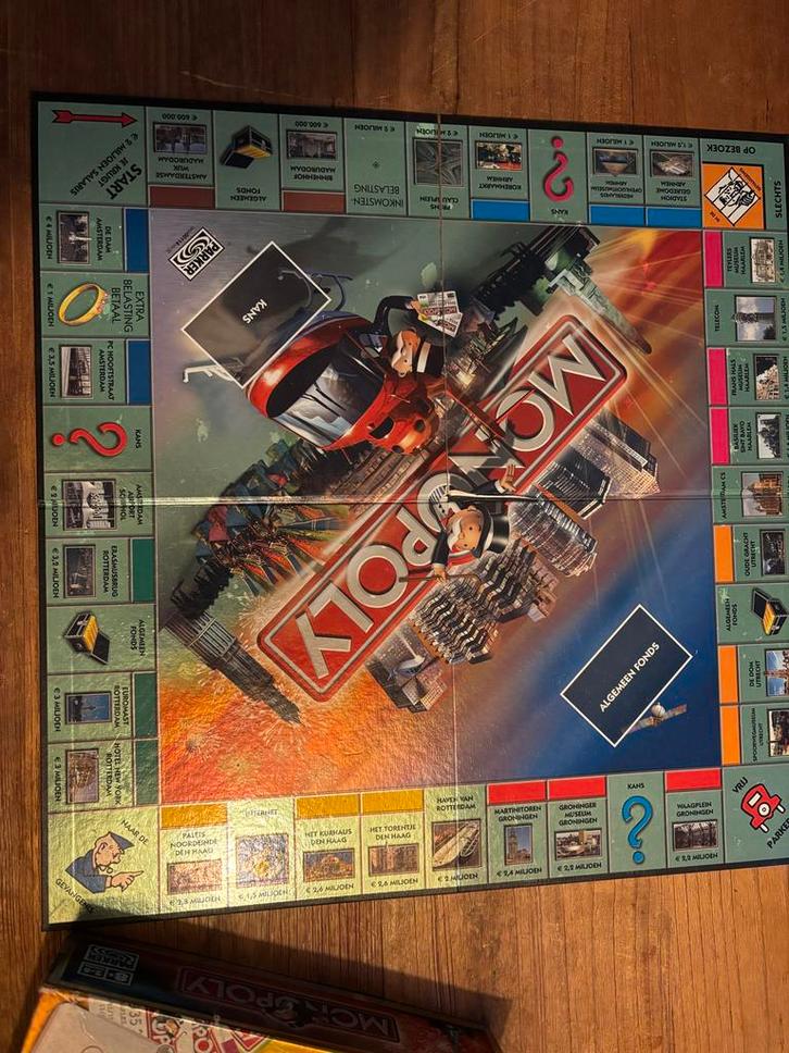 Monopoly Van Dam tot Dom Editie, Hobby en Vrije tijd, Gezelschapsspellen | Bordspellen, Gebruikt, Drie of vier spelers, Ophalen of Verzenden
