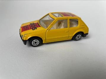 model Peugeot 205, geel, edocar (?) 1/50 beschikbaar voor biedingen