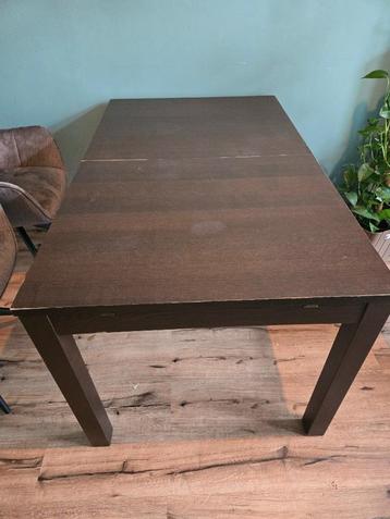 Eetkamertafel uitschuifbaar Bjursta van IKEA beschikbaar voor biedingen