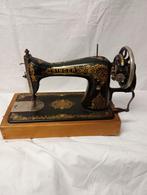 Singer handnaaimachine, Ophalen