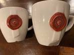 2 Grand Marnier koppen met schotels, Huis en Inrichting, Keuken | Servies, Ophalen of Verzenden, Zo goed als nieuw, Overige stijlen