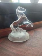 Vintage kristallen paard, Ophalen