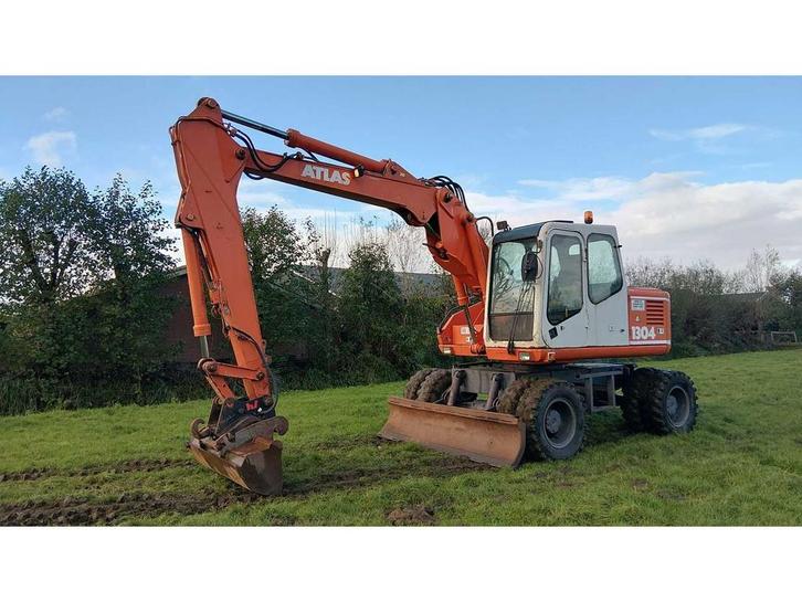 1994 Atlas 1304 Banden graafmachine, Zakelijke goederen, Machines en Bouw | Kranen en Graafmachines, Graafmachine