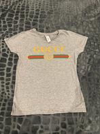 Shirt met Gucci opdruk t-shirt maat S grijs GG designer, Kleding | Dames, T-shirts, Ophalen of Verzenden, Zo goed als nieuw, Korte mouw