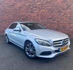 Mercedes-Benz C-Klasse C180 1.6 115KW Aut7 2016 Grijs AMG, Automaat, 1800 kg, Zwart, Leder en Stof