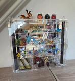 Te Koop kleine vitrine, Ophalen, Met plank(en), Zo goed als nieuw, Minder dan 25 cm