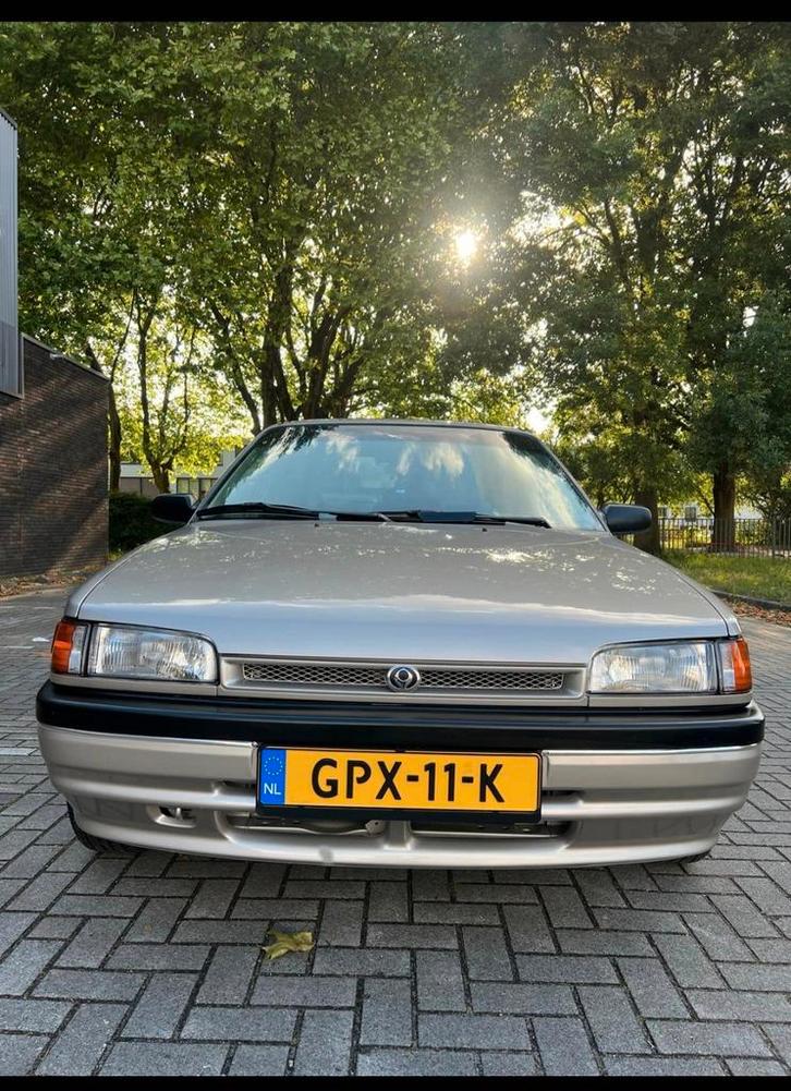 MAZDA 323 1.6 16V 1993 BRUIN AUTOMAAT, Auto's, Volkswagen, Particulier, Sedan, Geïmporteerd, Bruin, Ophalen